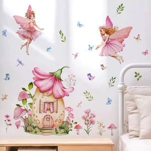 Stickers muraux aquarelle fée et maison de fleurs au-dessus d'un lit blanc de chambre