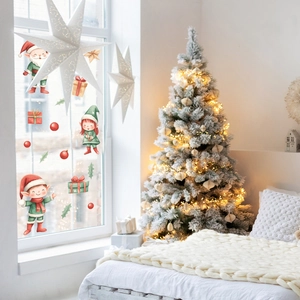 Cozy bedroom window detail featuring watercolor Santa and gnome static cling stickers