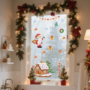 Detailed view of festive Christmas window stickers with Santa, gingerbread house and tree