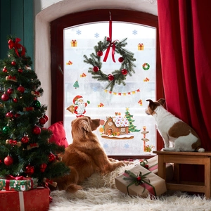 Cozy home scene with Santa, gingerbread house, and tree static Christmas window stickers