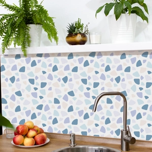 Kitchen backsplash featuring blue and beige pebble pattern self-adhesive tile stickers