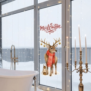 Détail d'autocollant de fenêtre de Noël avec un renne, écharpe rouge et texte Merry Christmas