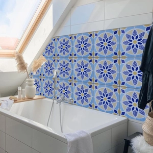 Close-up of blue and yellow Moroccan style waterproof tile stickers in a bright bathroom