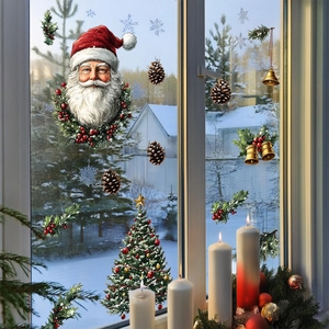 Christmas window clings featuring Santa, trees, and golden bells against a snowy backdrop