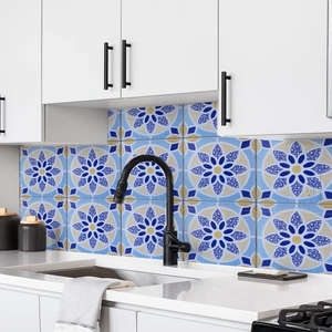 Detail of blue and yellow mandala PVC tile stickers on a modern kitchen backsplash