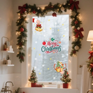 Close-up of Merry Christmas window stickers with bells, snowflakes and gift boxes
