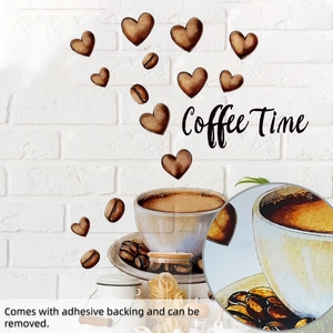 Detail of coffee cup and heart wall stickers with removable adhesive on white brick wall