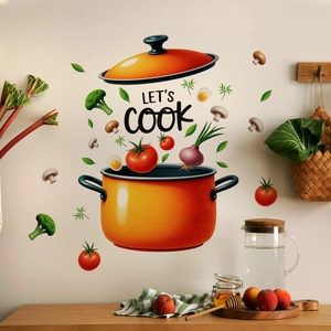 Detail of Let's Cook kitchen wall sticker with orange cooking pot and vegetable elements