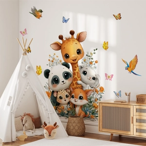 Detail of cartoon animal wall stickers with giraffes and pandas in a cozy nursery room