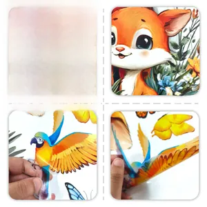 Detail of cartoon fox and parrot wall stickers showing the front and adhesive reverse side