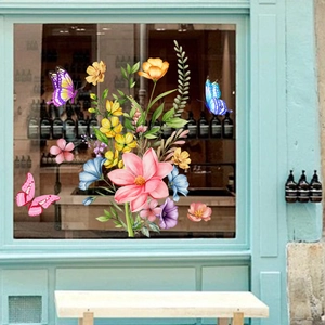 Vibrant pink floral tulip and colorful butterfly static window stickers on a glass pane