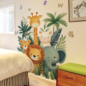 Cartoon jungle animals wall decals with giraffe and lion in a cozy bedroom setting