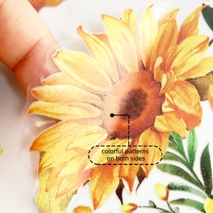 Close-up of double-sided sunflower static window sticker showing transparent film texture