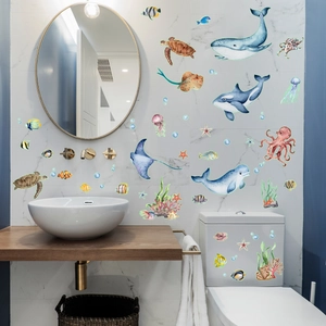 Luminous marine animal wall stickers featuring watercolor whales and turtles for bathroom decor
