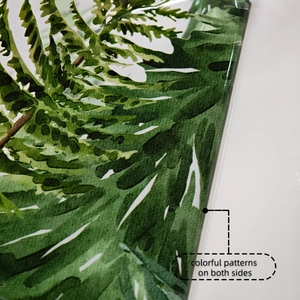 Detailed close-up showing the double-sided colorful plant patterns on static window film