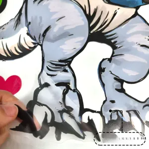 Close-up showing the easy-to-peel adhesive backing of the dinosaur gamepad wall sticker