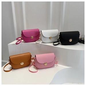 Close-up of litchi texture saddle bags in five colors with golden metallic buckles