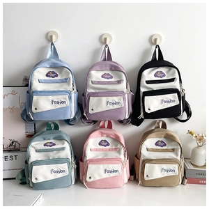 Detailed display of six colorful mini nylon backpacks featuring fashion sport cloud patches