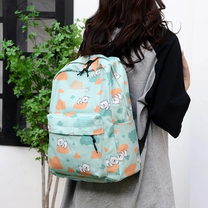 Sac à dos dinosaure vert clair avec motifs d'oursons et étiquette tendance