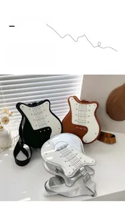 Detailed view of guitar-shaped crossbody bags in black, brown, and metallic silver finishes