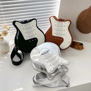 Creative guitar shaped crossbody bag in PU leather with stylish wide woven shoulder strap