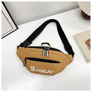 Close-up of mustard yellow nylon crossbody bag with TEVGRUN7 letter print and buckle