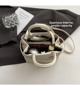 Interior view of cream leather bucket bag showing large capacity for daily essentials
