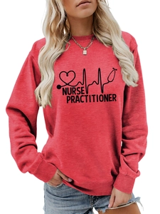Detail view of the Nurse Practitioner heartbeat and stethoscope print on the red sweatshirt