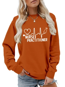 Detailed view of the ribbed crewneck and nurse practitioner print on an orange sweatshirt