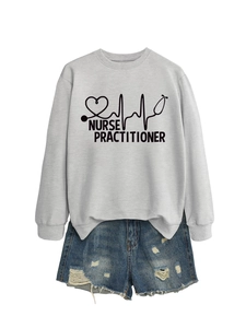 Detailed flat lay of grey Nurse Practitioner sweatshirt with denim shorts and medical logo