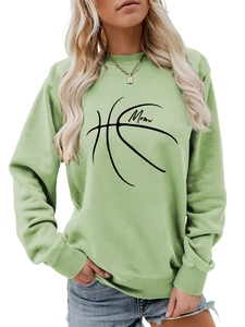 Close-up of sage green sweatshirt featuring basketball heart and Mom graphic design
