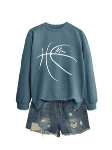 Flat lay of gray blue long sleeve sweatshirt with basketball mom print and ripped denim shorts