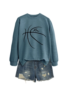 Flat lay of gray-blue Mom basketball sweatshirt with distressed denim shorts