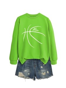 Detail of green long sleeve crewneck sweatshirt with basketball Mom design and denim shorts