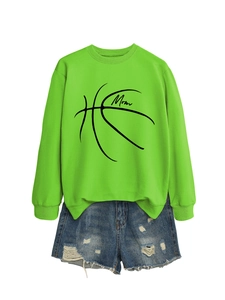 Neon green sweatshirt with basketball Mom graphic paired with blue denim shorts