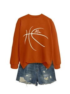 Detail of caramel Mom basketball sweatshirt with distressed denim shorts on white background