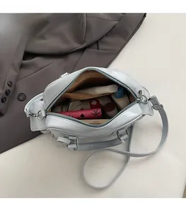Top view showing the spacious interior compartment of the light blue Boston tote bag