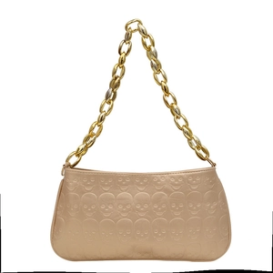 Champagne gold underarm bag with skull embossed leather and chunky metal chain strap