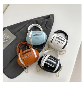 Rugby shaped handbags in four colors featuring pebble leather texture and gold chain straps
