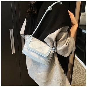 Light blue quilted shoulder bag with Fashion & Bags text on minimalist PU leather