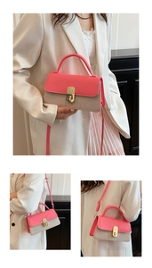 Detailansicht der Umhängetasche aus rosa Leder und khakifarbenem Webstoff mit Schnalle
