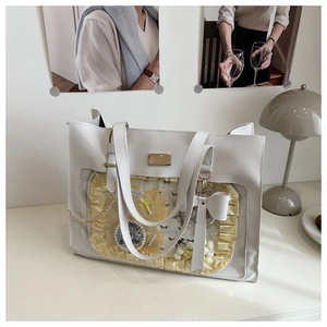 Detailed view of white tote bag with transparent PVC window and yellow wavy interior lining