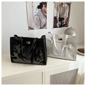 Detailed view of the large capacity ita bag with transparent window and bow decoration