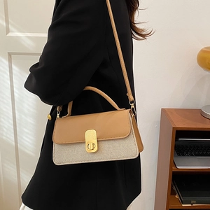 Minimalist vintage two-tone flap bag with gold clasp and top handle for women