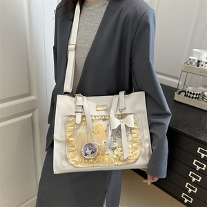 White large capacity ita bag with transparent window and decorative ribbon bow details