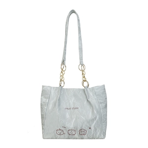Silver metallic pleated tote bag with cartoon bears and gold chain strap handle