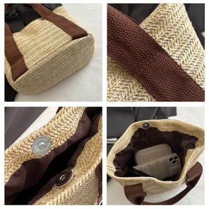 Close-up of woven straw tote bag featuring brown fabric lining and magnetic metal clasp