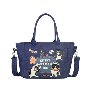 Casual blue denim tote bag with cute cartoon prints and adjustable shoulder strap