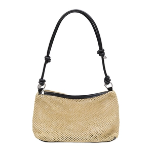 Light brown woven straw tote bag with black knotted shoulder strap and zipper closure