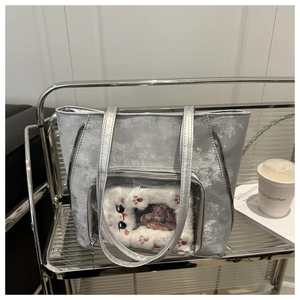 Silver velvet tote bag featuring transparent window for plush toys and photo display